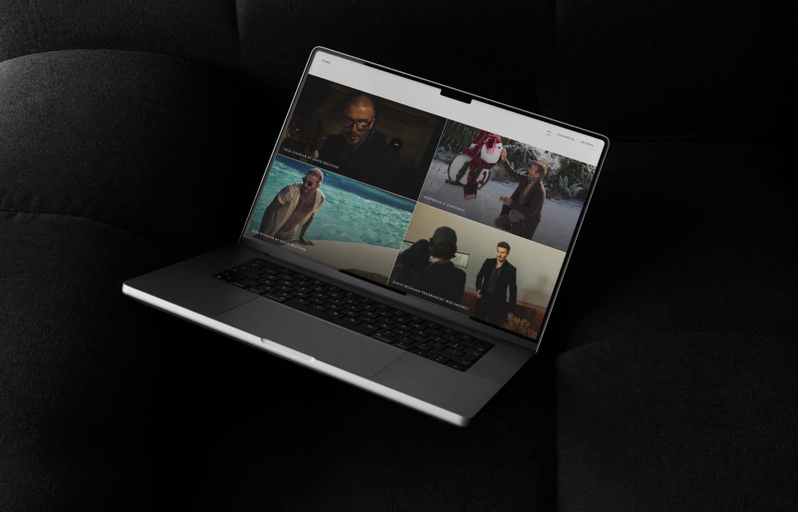 Top web development agency in the UK showcasing creative projects on a laptop screen.