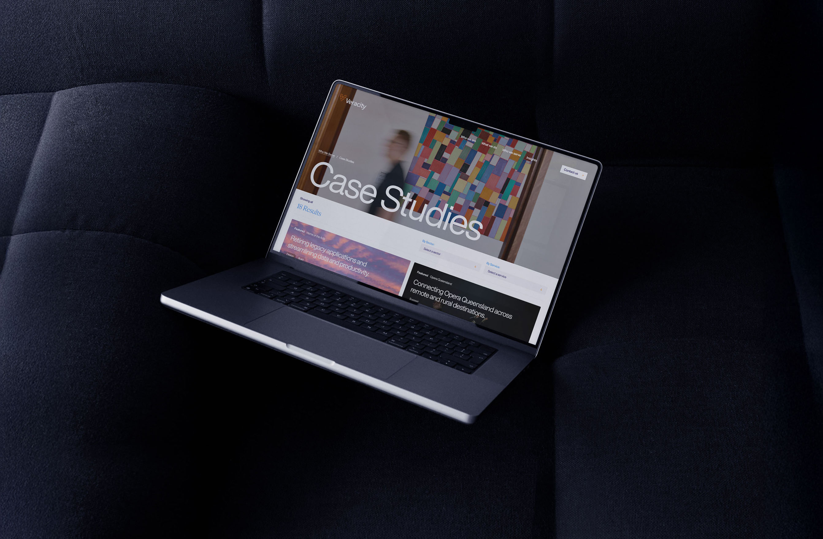 Top creative website agencies in London showcasing innovative designs on a laptop screen.